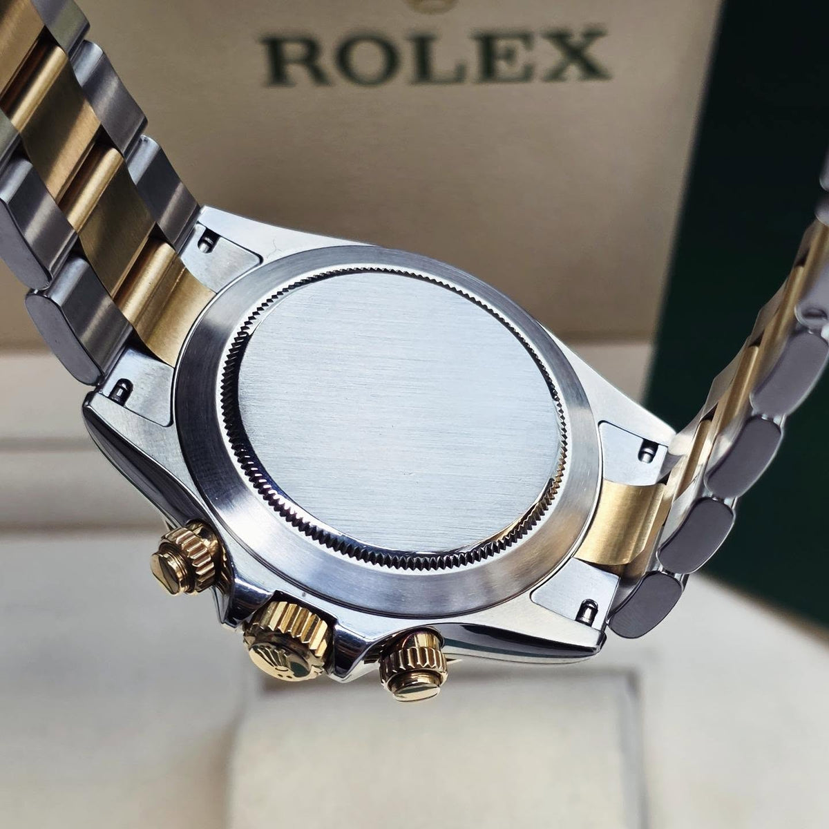 ROLEX DAYTONA BLACK AND GOLD