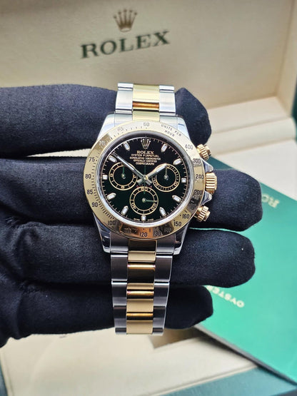 ROLEX DAYTONA BLACK AND GOLD